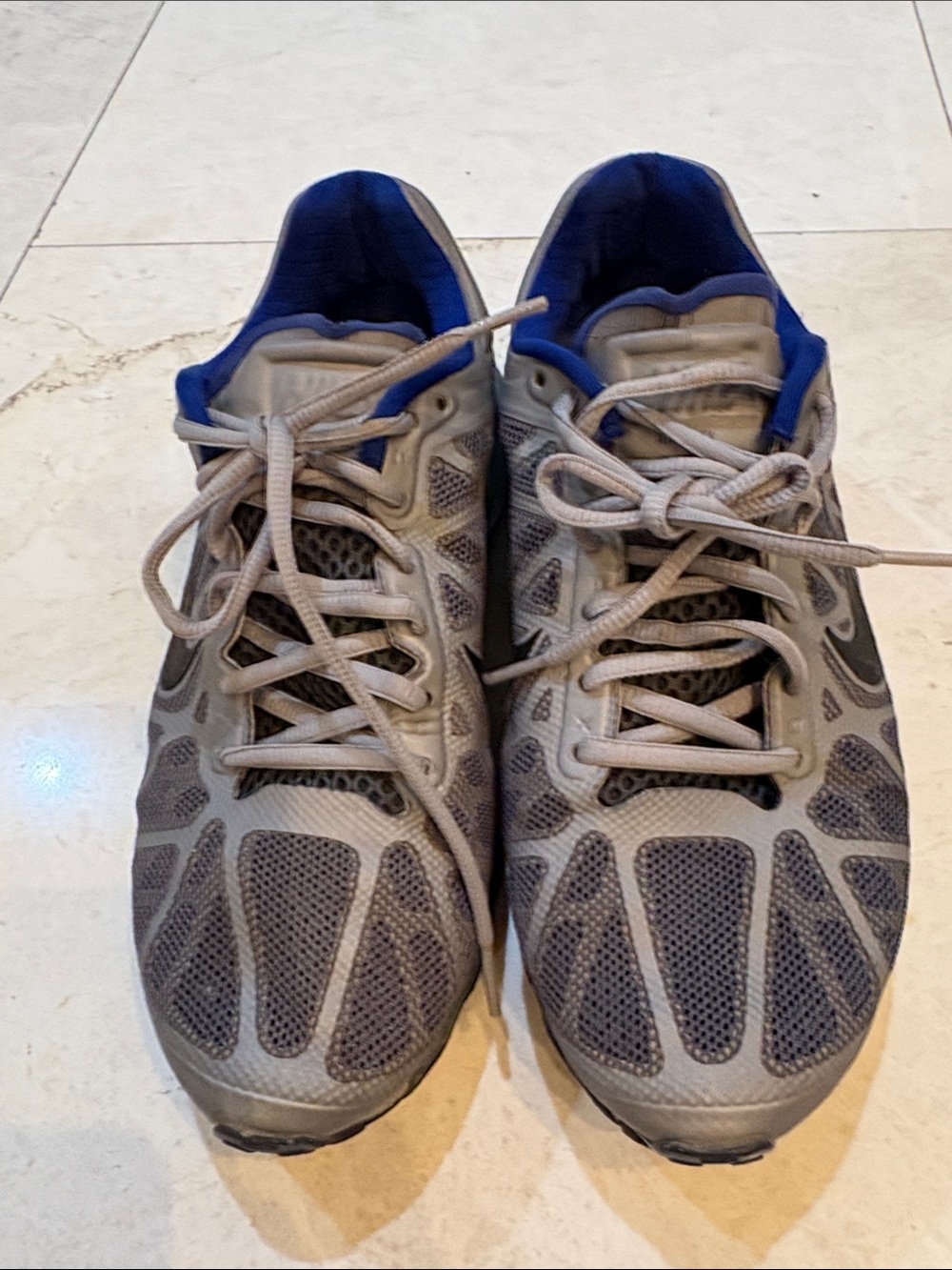 Nike Men's Gray Athletic Shoes with Blue Lining